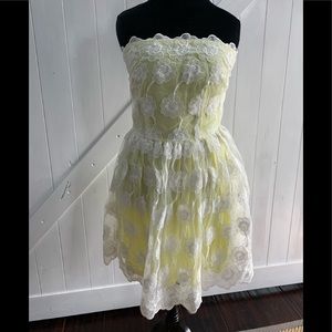 Pale yellow and white strapless dress